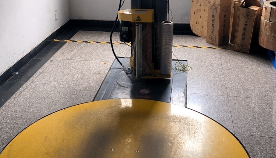 Wrap film baler electrostatic removal case